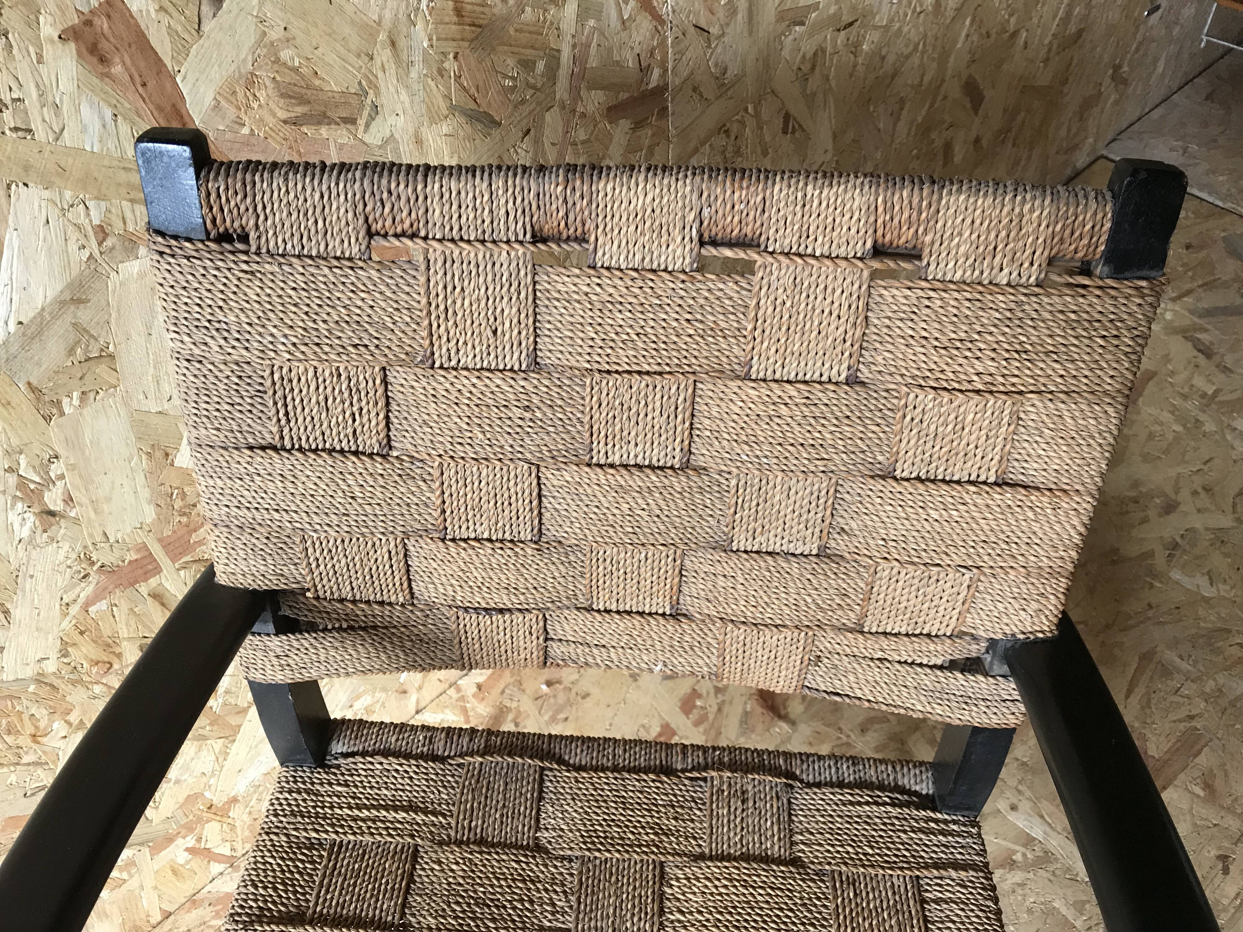 Vintage armchair with woven cord and wooden frame, Axel Larsson, circa 1960.