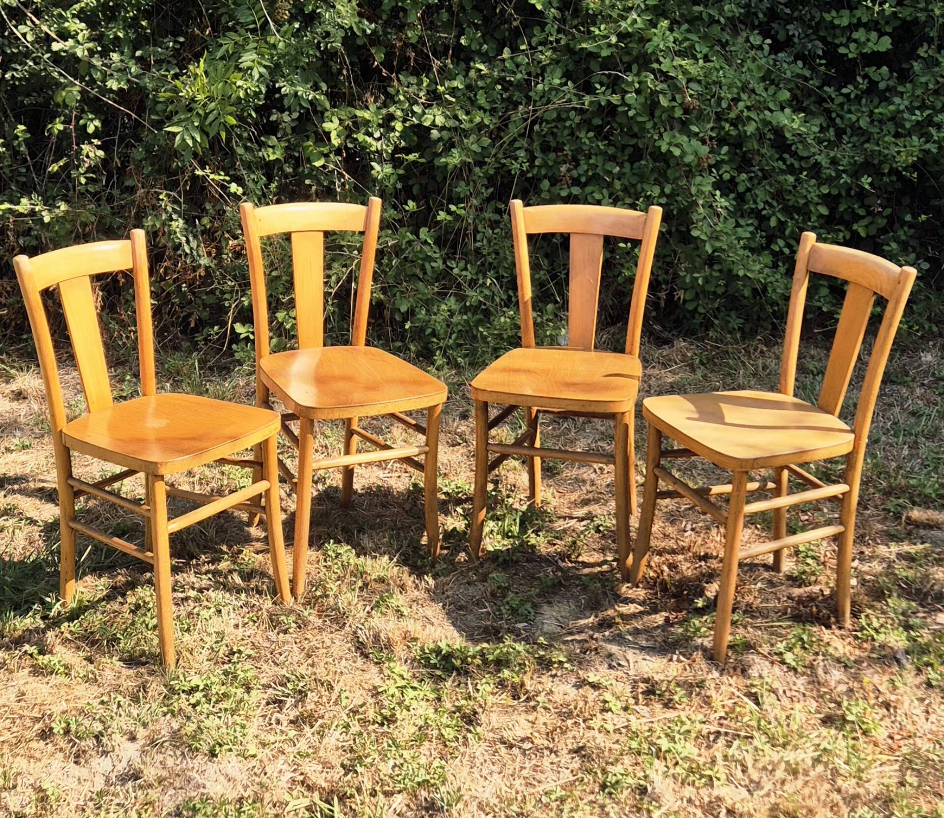 4 vintage bistro chairs from the 1950s in raw wood