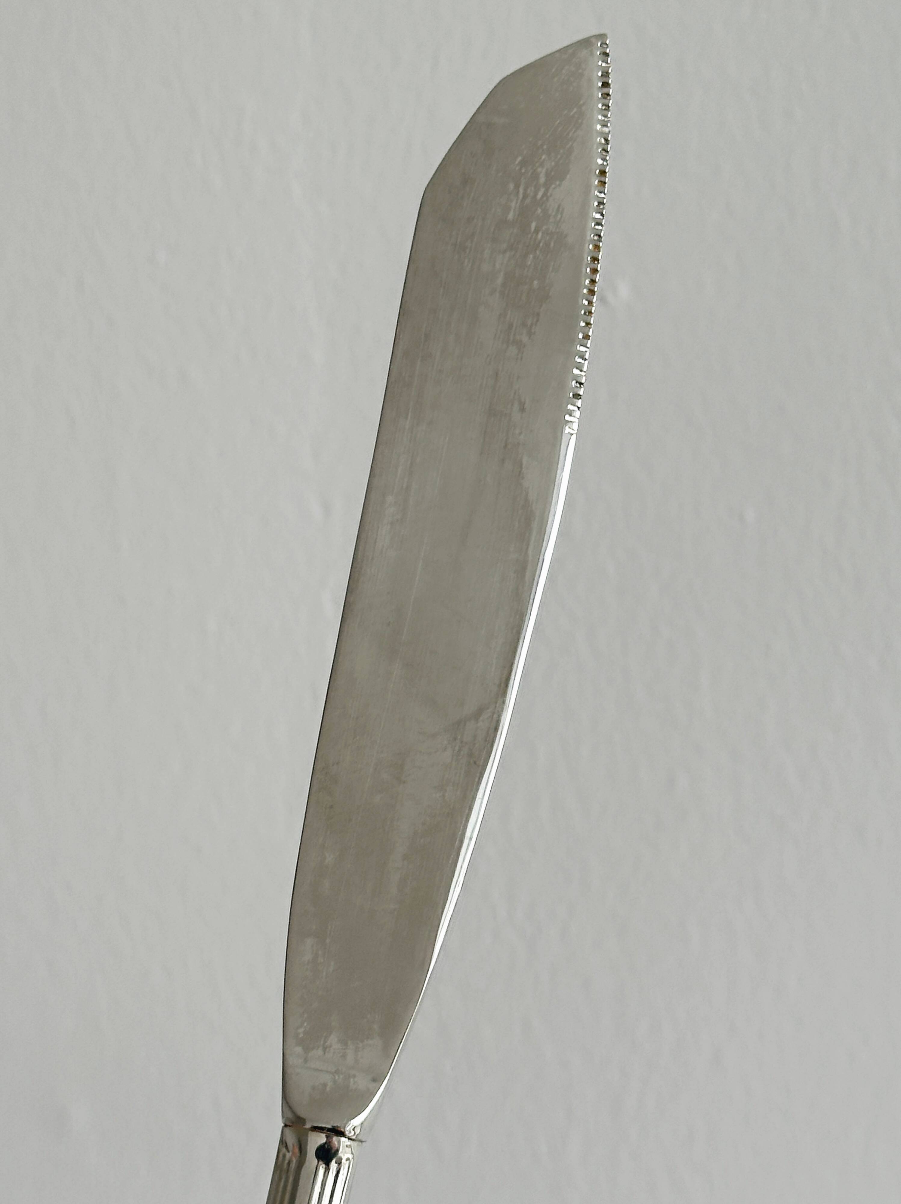 Antique patinated metal serving cutlery