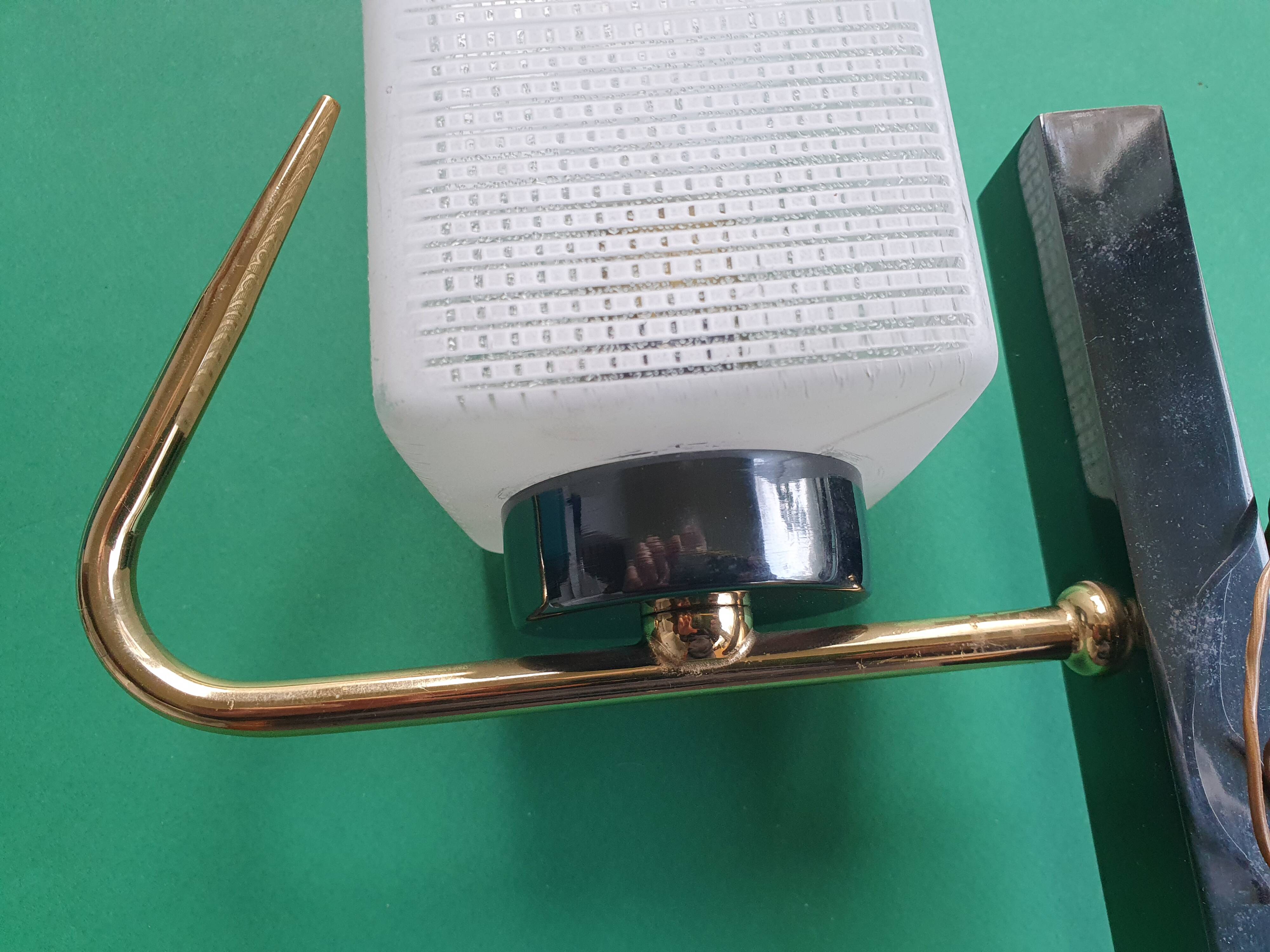 Three antique gold Arlus wall lights from the 50s