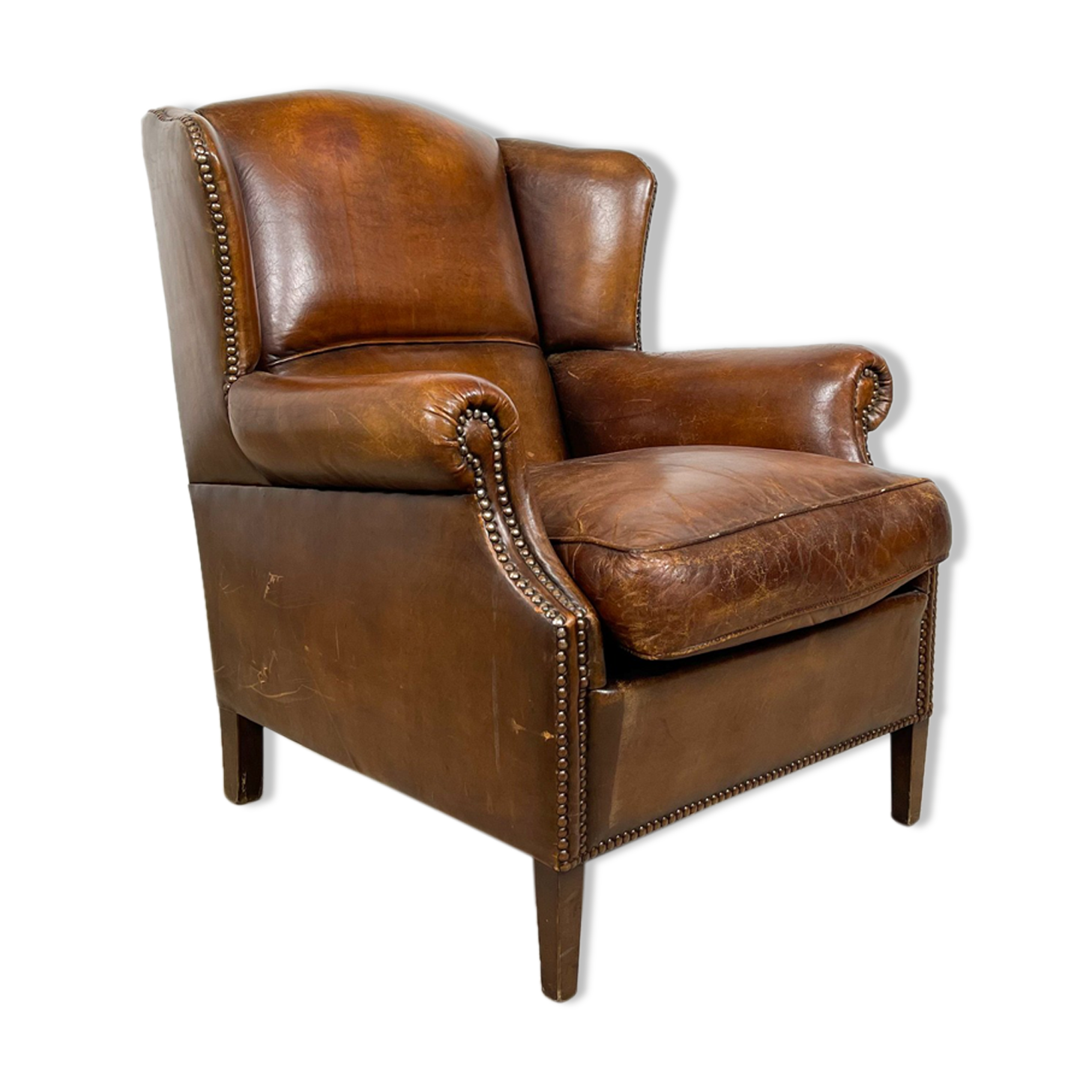Dark brown sheep leather wingback armchair vintage