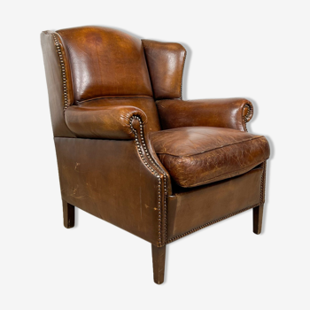 Dark brown sheep leather wingback armchair vintage