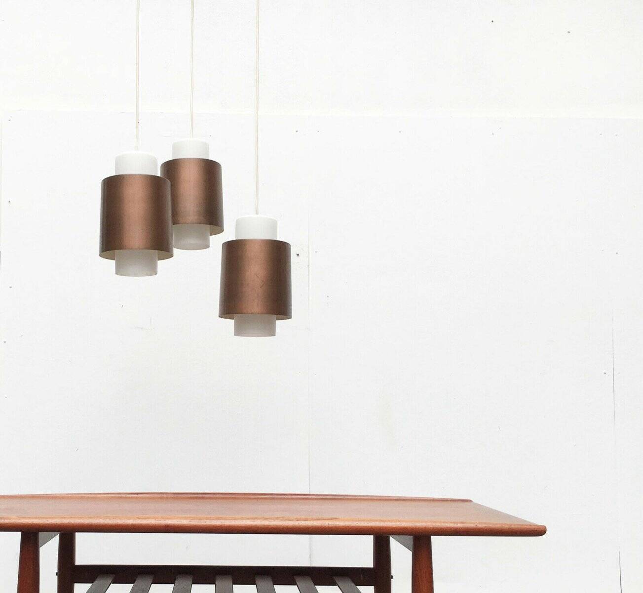 Triple cascade pendant lamp in copper and glass from the modern German space age of the mid-century by Staff, 1960s.