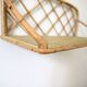 Rattan wall shelf