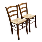 2 solid wood and straw chairs