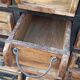 Black metal storage cabinet with 60 wooden drawers