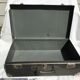 Vintage dark grey metal suitcase