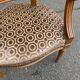 Solid wood and velvet armchair in Louis XVI style