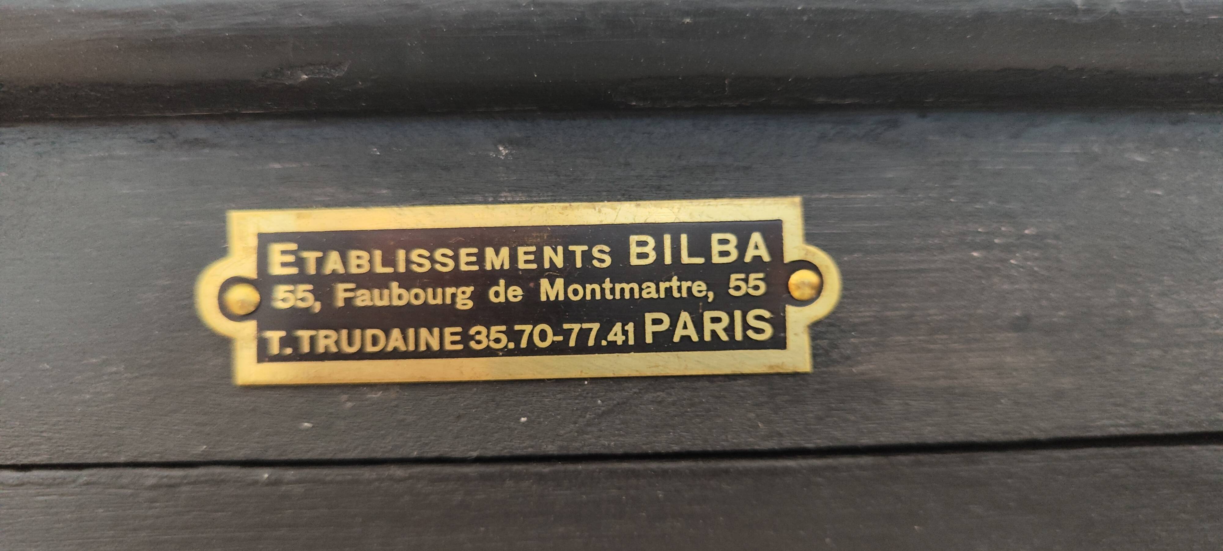 Old two-door shop showcase with black patina