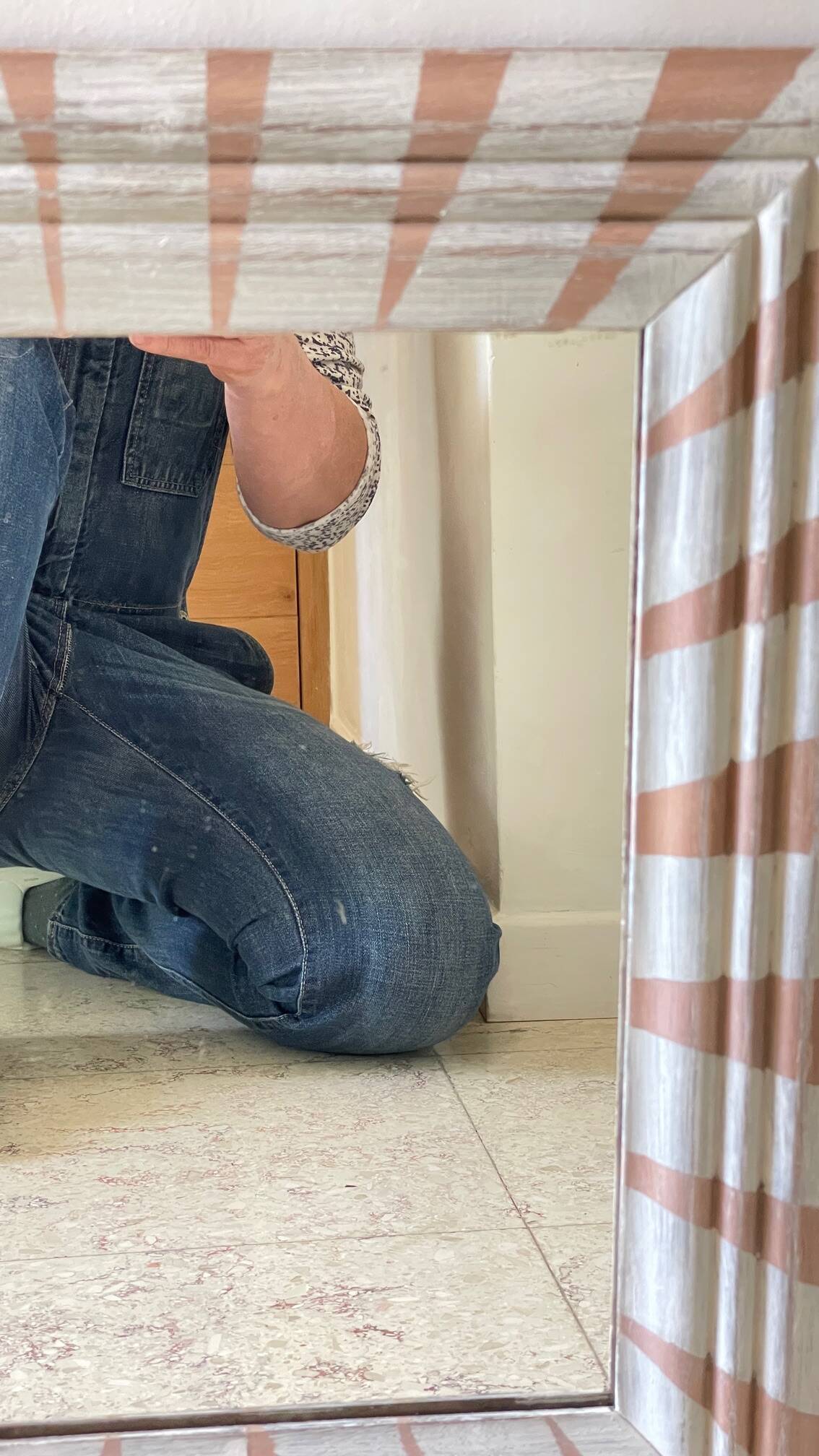 Old mirror in hand-painted wood