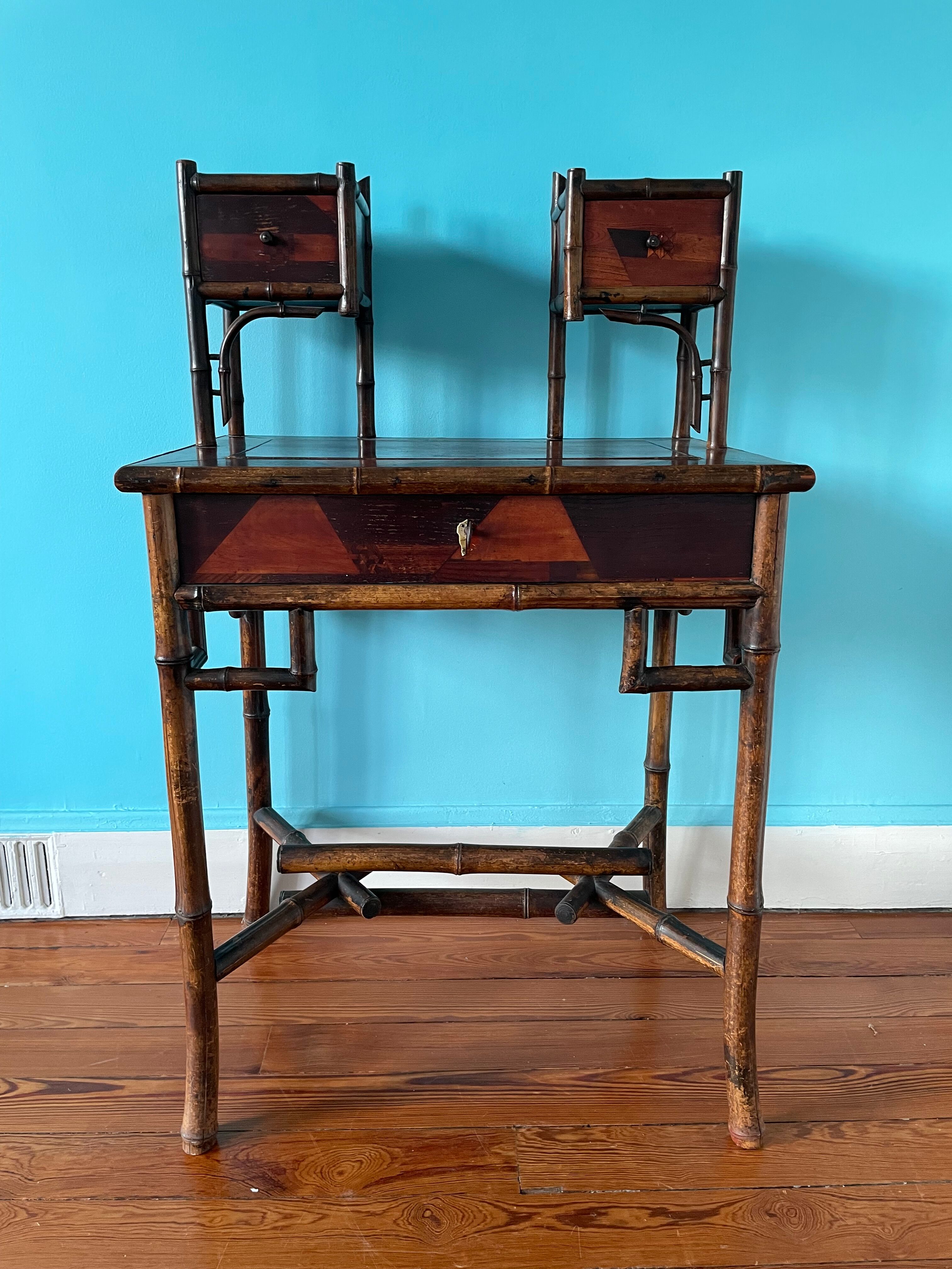 Old secretary in marquetry and bamboo