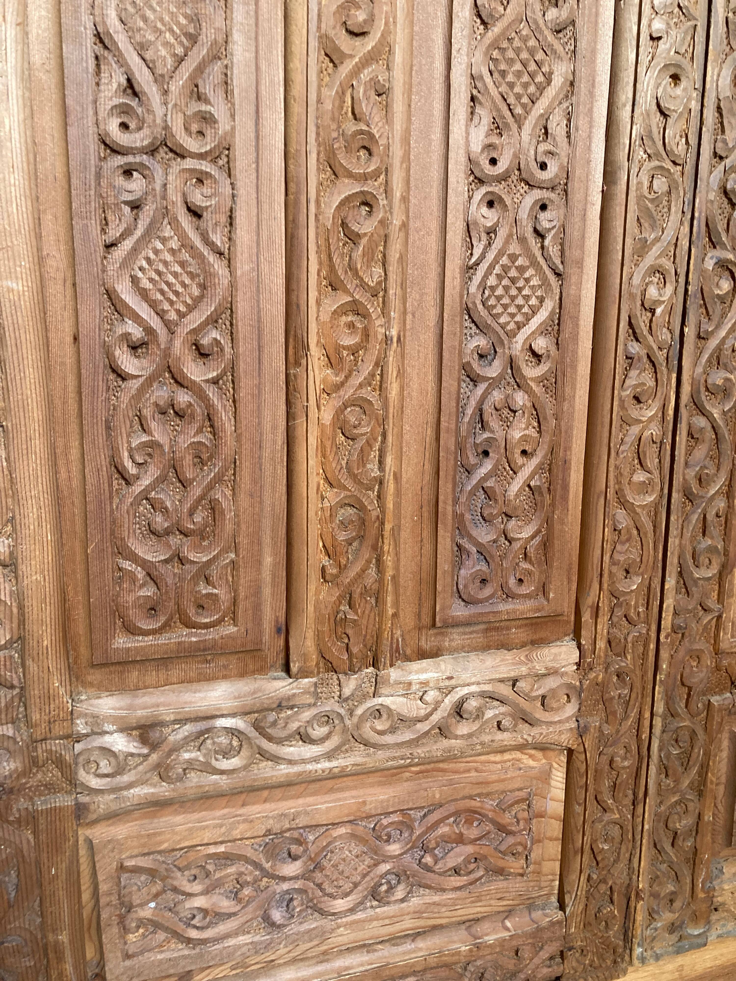 Wardrobe with exotic carved doors