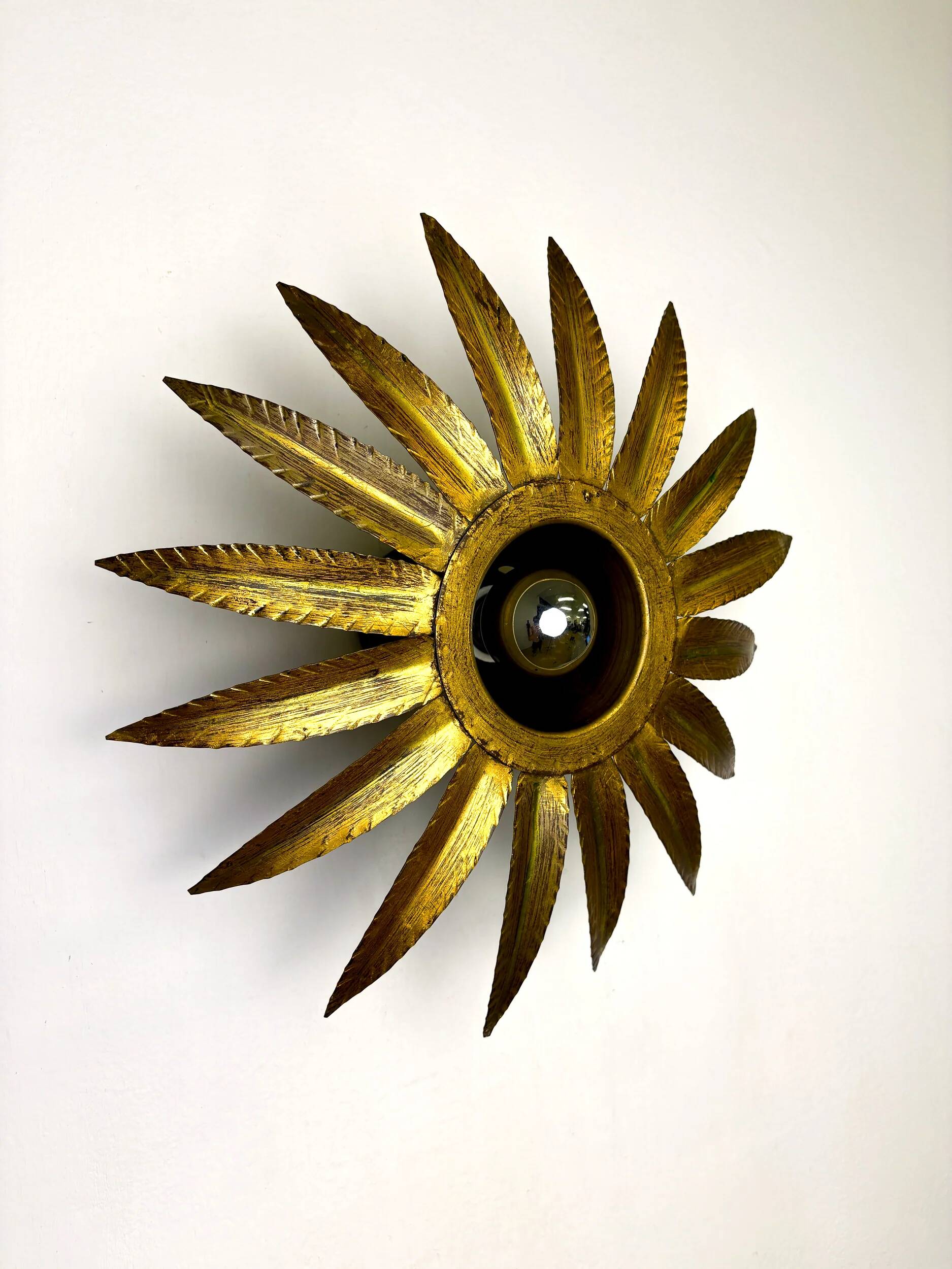Spanish sunburst flush mount light fixture in gilt iron, Ferro Art, 1960s