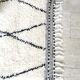 Berber carpet béni ouarain black and white with diamonds and braided border