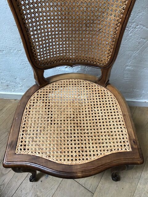 Old wooden chair and caning