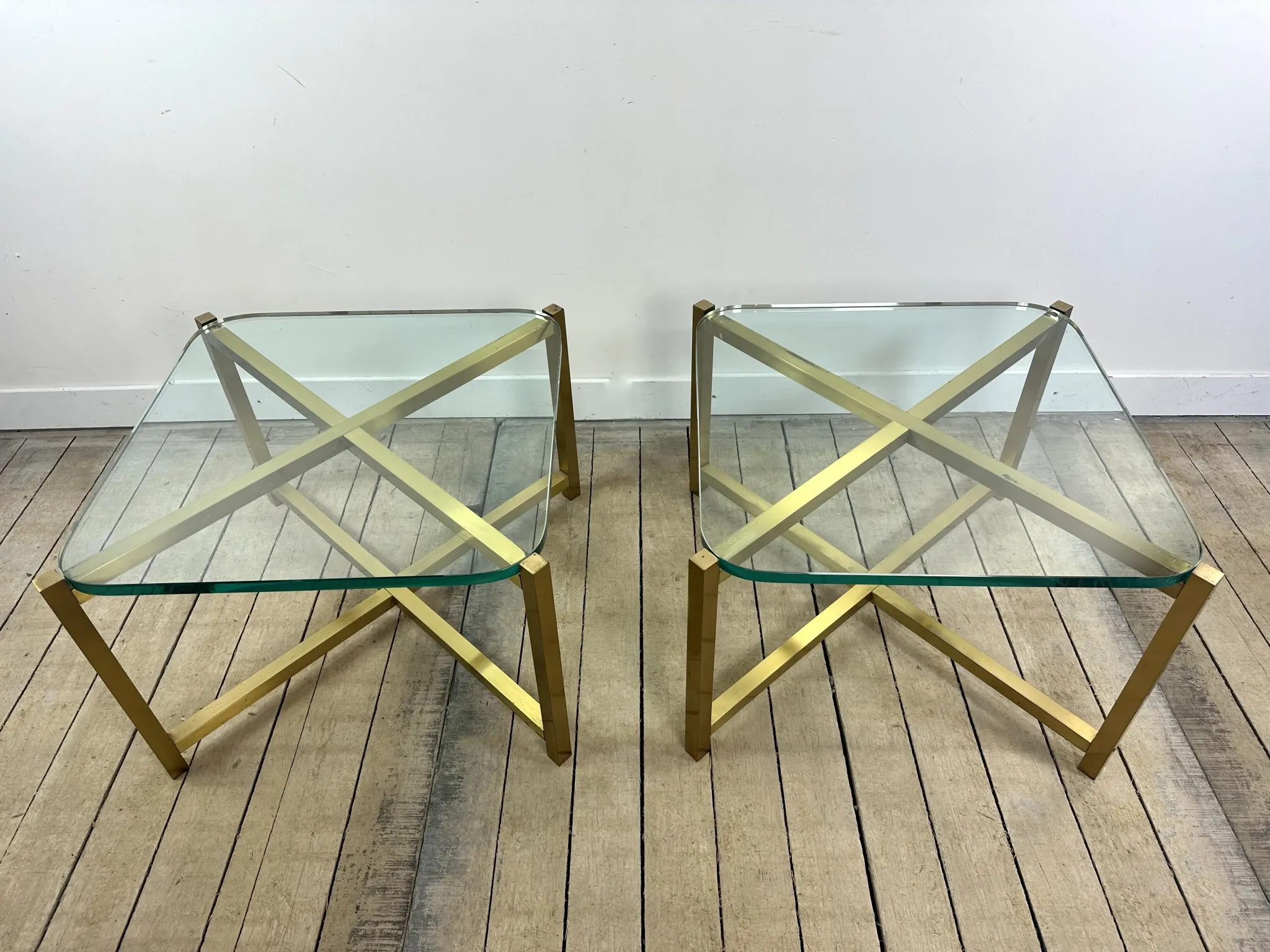 Pair of Italian brass and glass side tables from the 1970s.