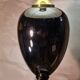 black glazed and gold ceramic lamp