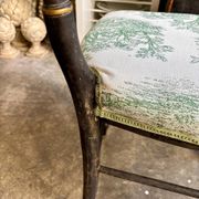 Napoleon III chair in blackened wood and green toile de Jouy.