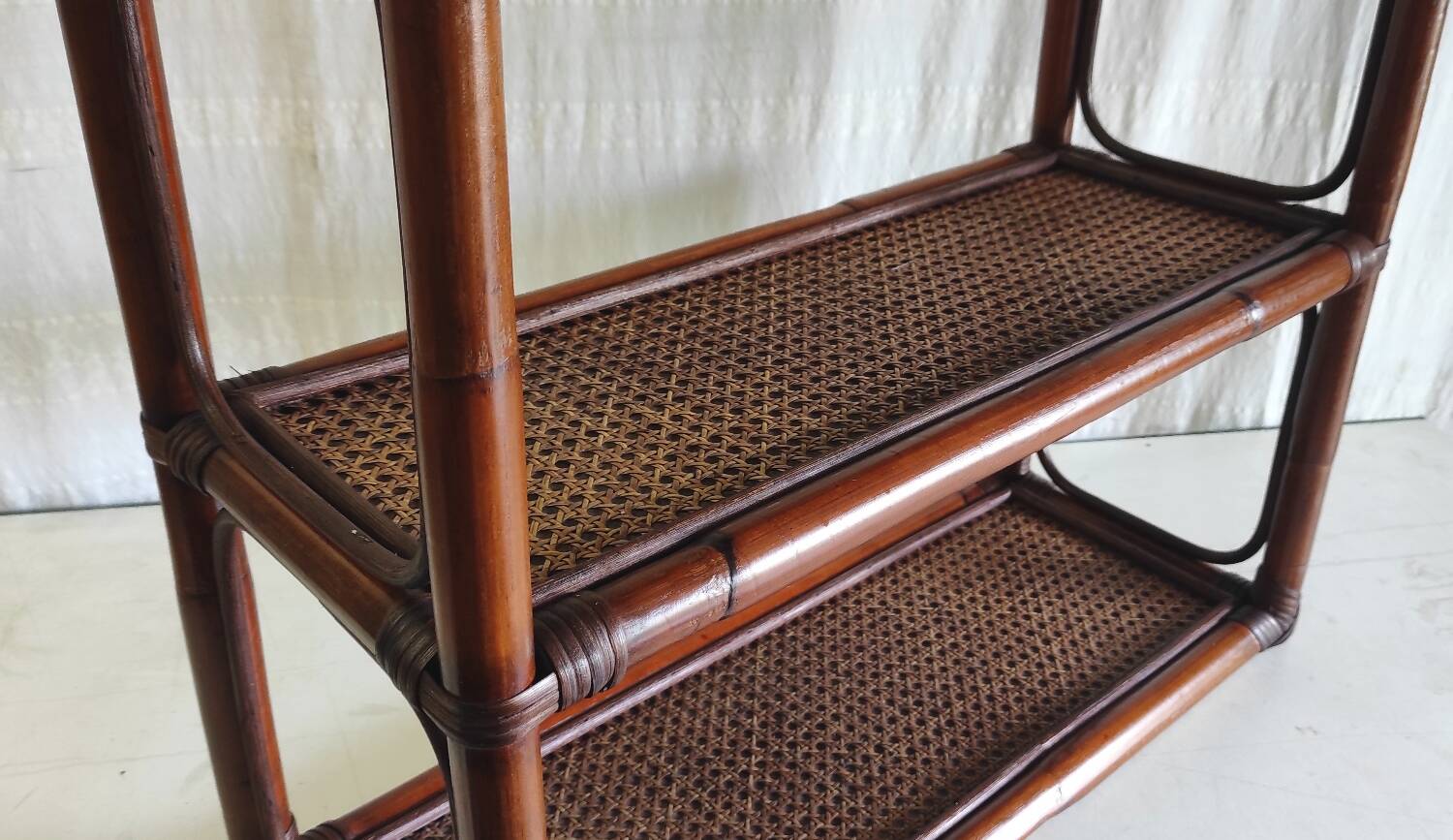 Rattan and cane wall shelf - late 20th century