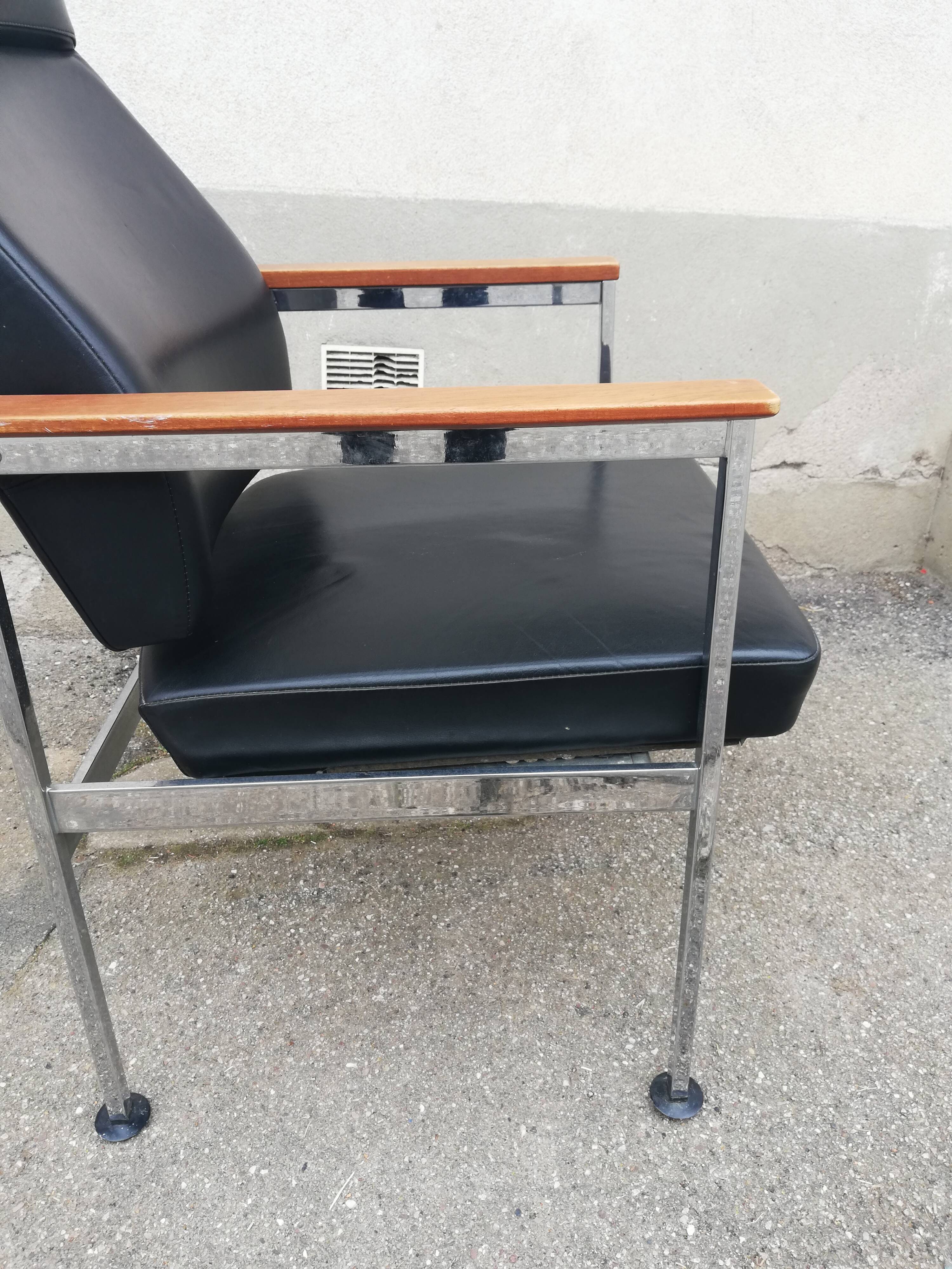 Vintage leather and teak armchair