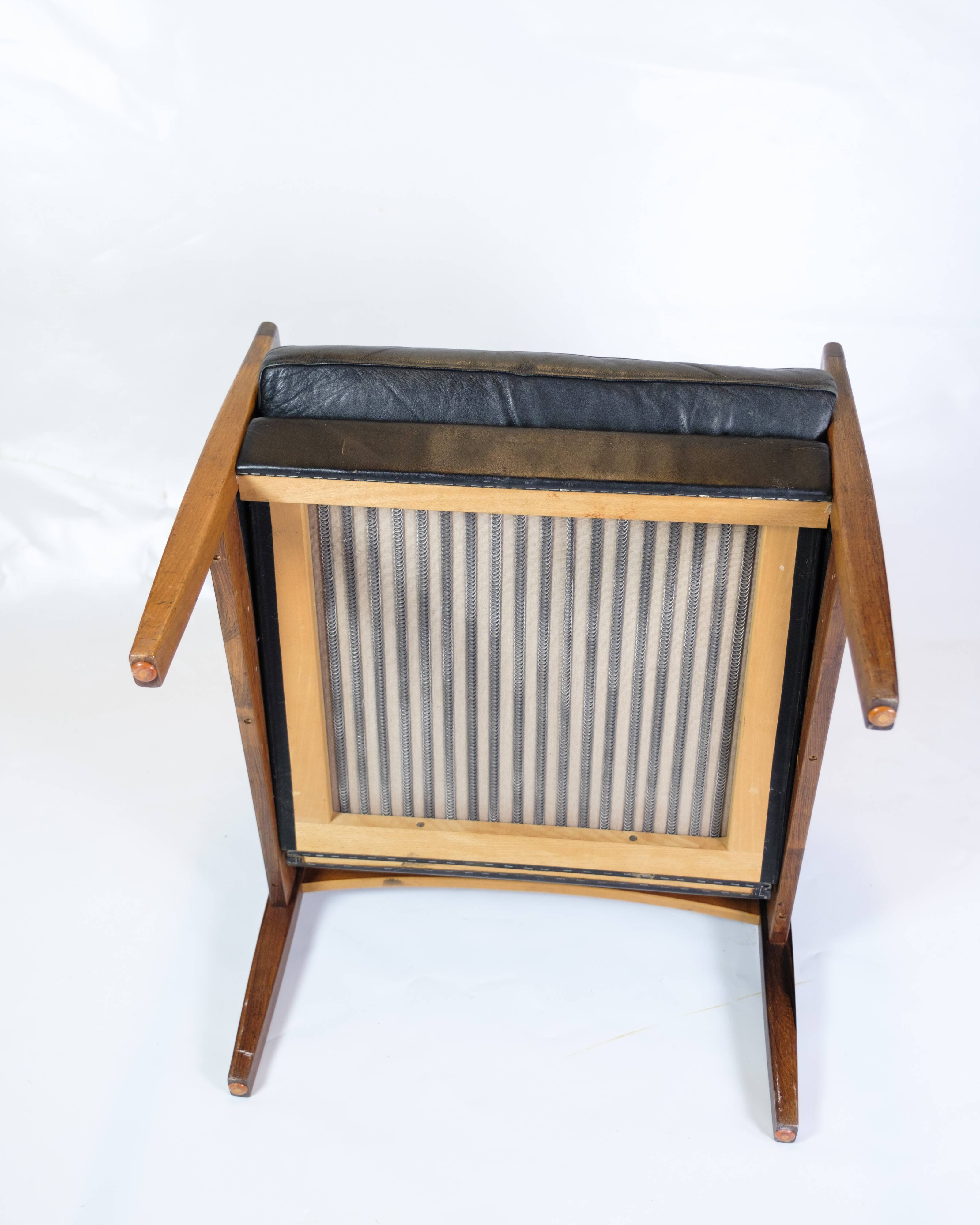 Armchair Made In Rosewood & Black Leather Cushions By Hans Olsen From 1960s