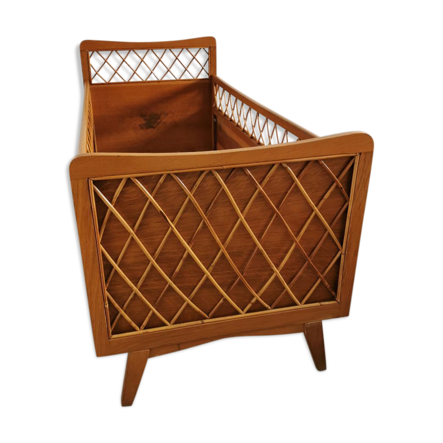 Rattan bed with compass feet