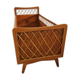 Rattan bed with compass feet