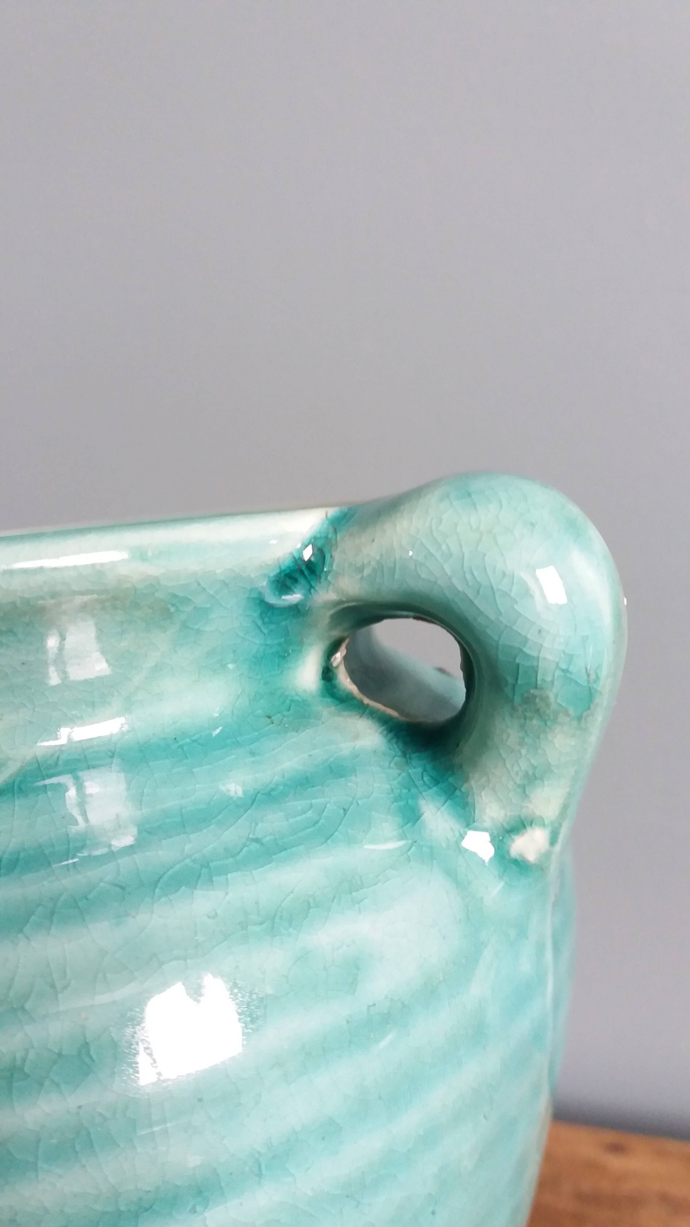 Glazed green-blue ceramic vase