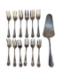 Set of 12 dessert forks and a cake server.