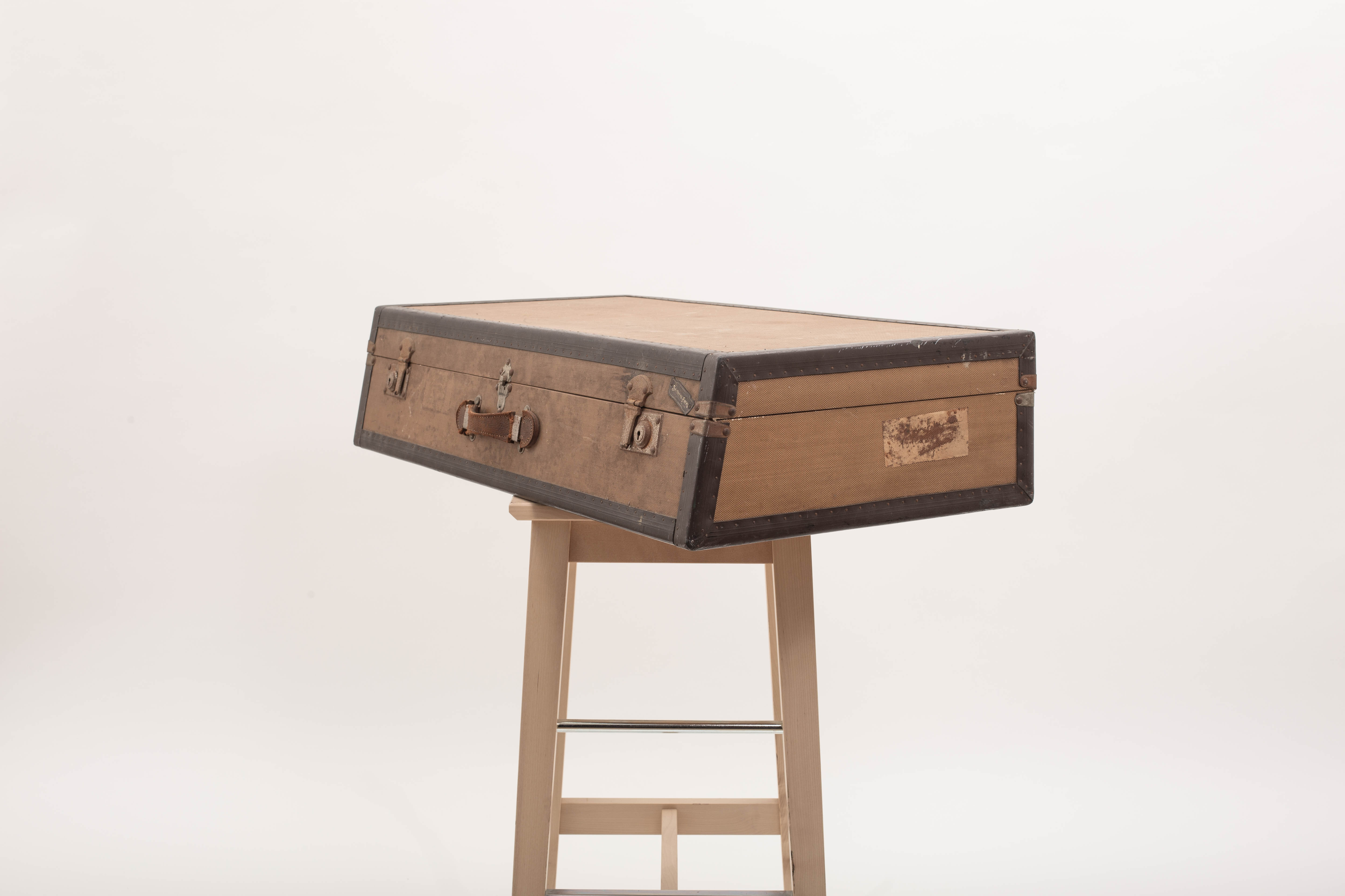 Pair of old rigid suitcases for cars