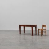 Oak Art Deco dining table with carved frieze, France 1920s