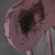 Rocking-chair vintage 50 in pink patina wood