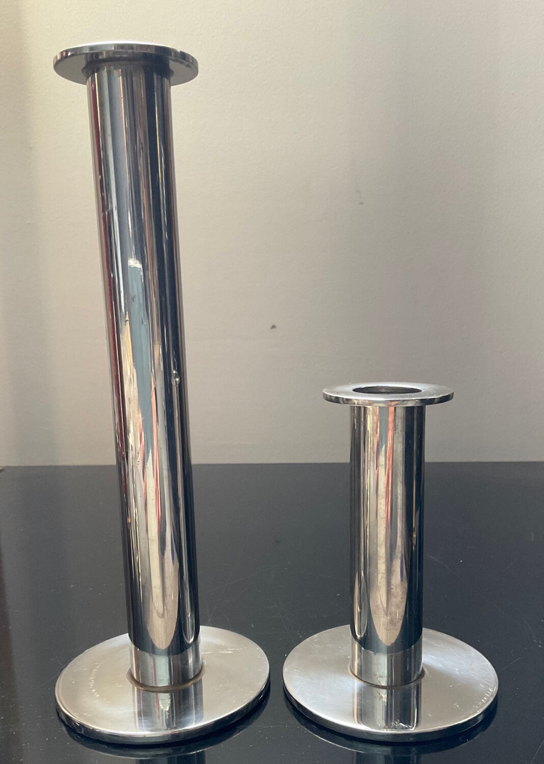 Duo of vintage candle holders in silver metal