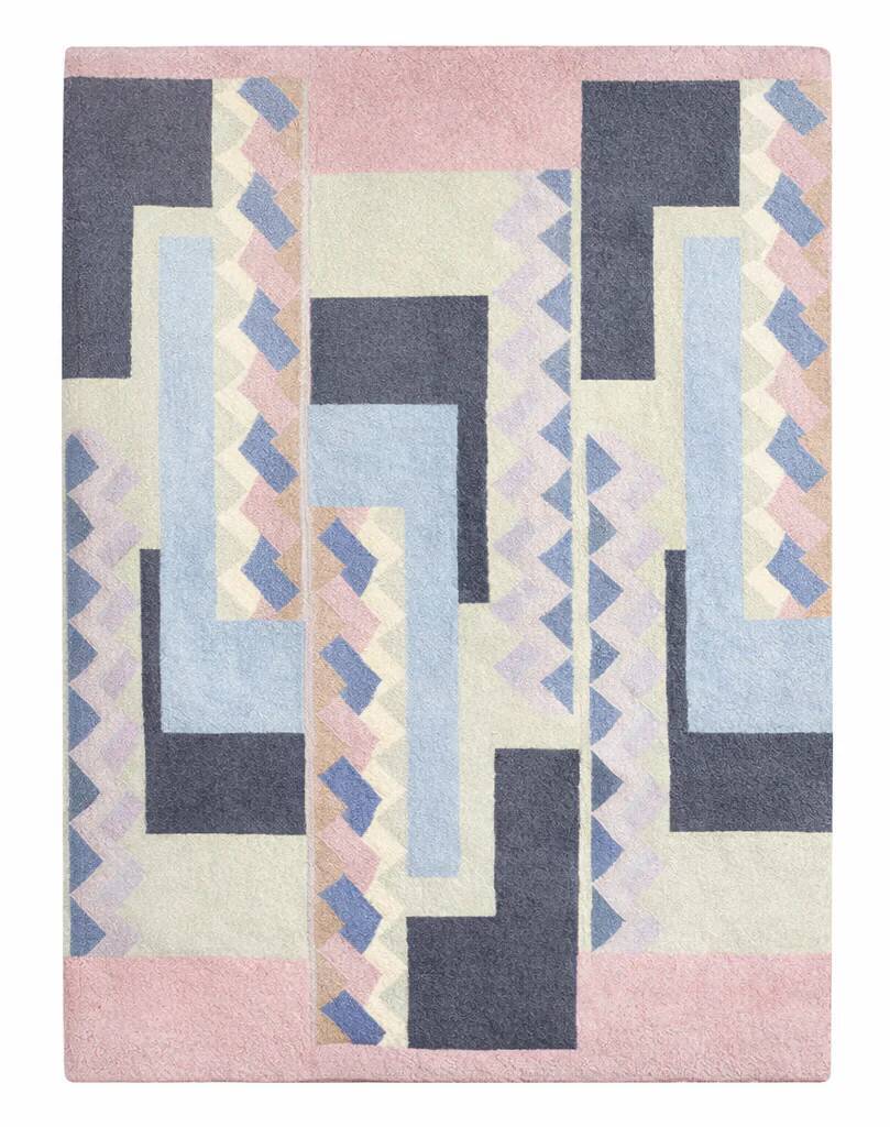 Hand-knotted wool rug by Tisca with a geometric pattern, signed "ILES", France, 1990s.