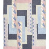 Hand-knotted wool rug by Tisca with a geometric pattern, signed "ILES", France, 1990s.