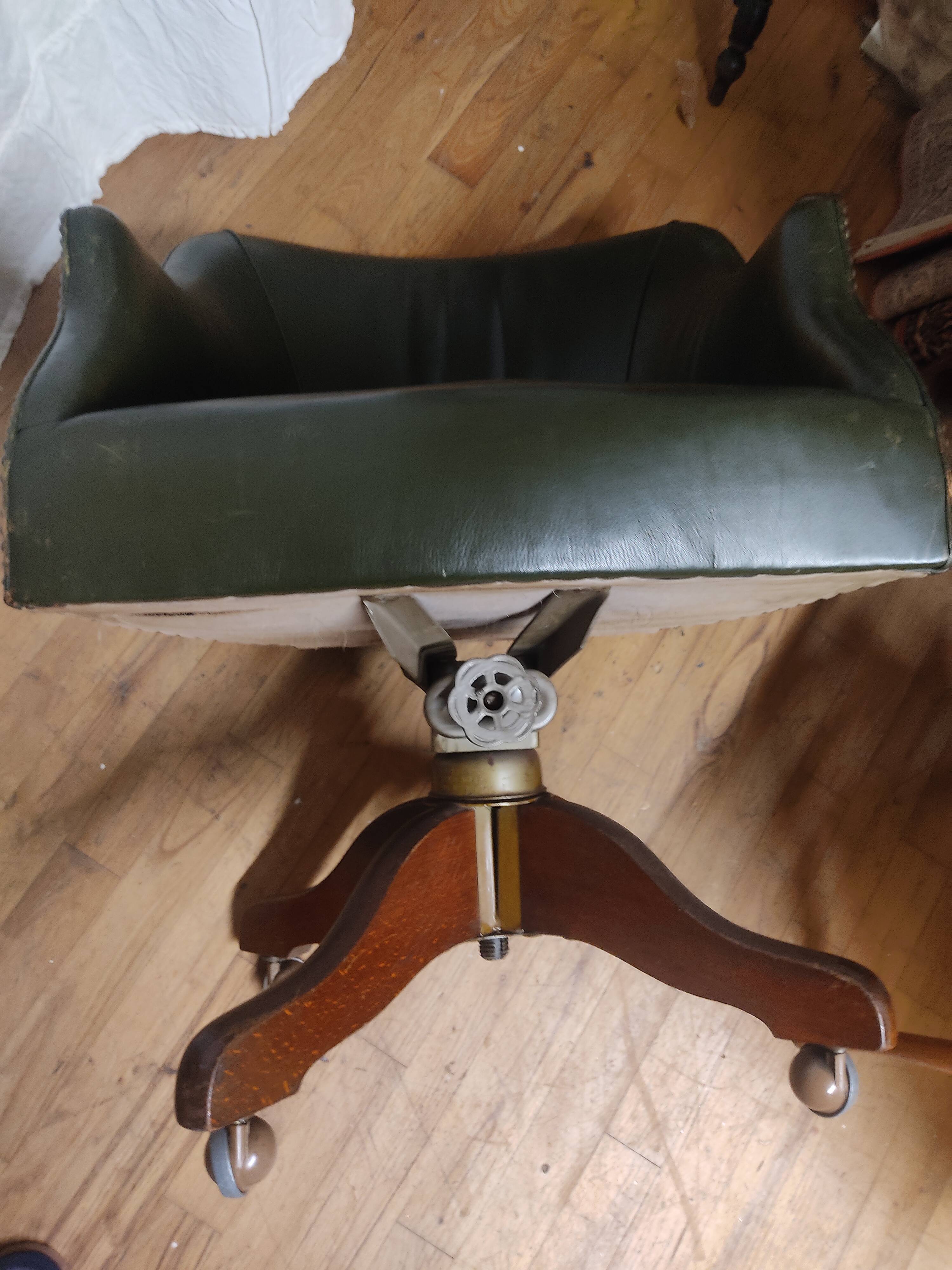 Fauteuil de bureau cuir vert.tournant.