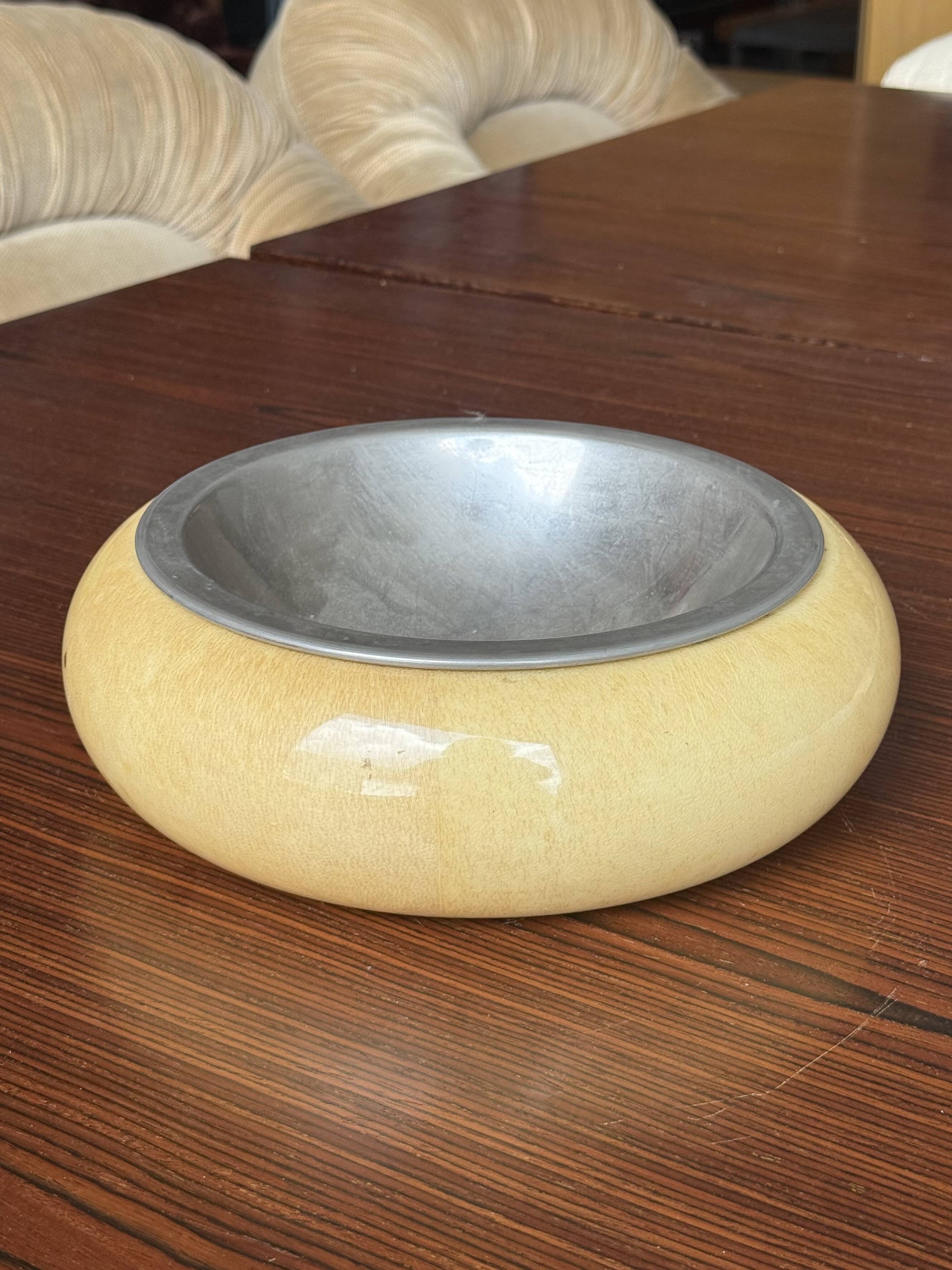 Set of two Aldo Tura bowls in goatskin and brass