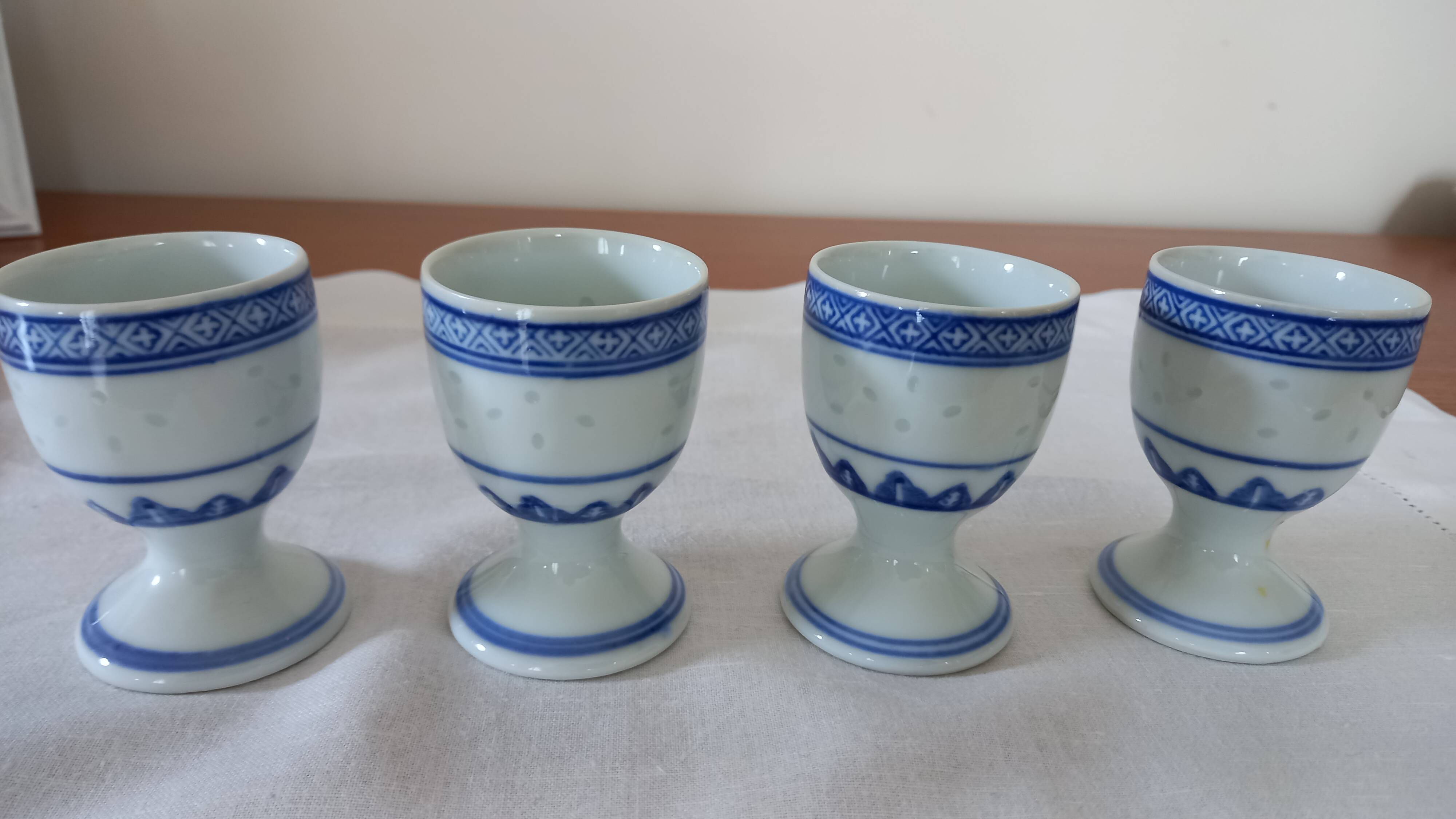 Set of 4 blue and white egg cups