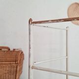 Old towel rack in patinated white wood