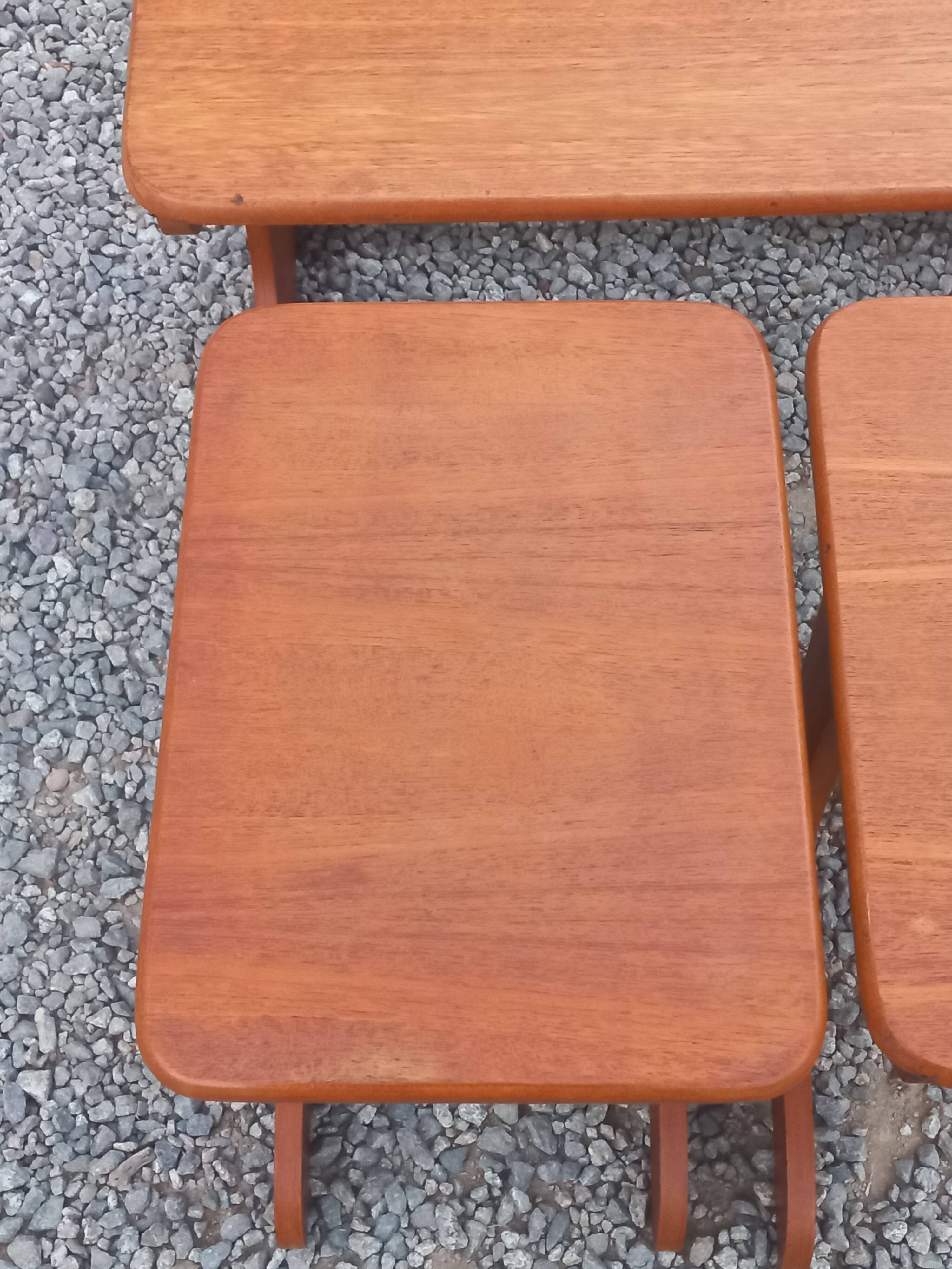 Set of 3 nesting tables in Scandinavian style made of teak from the 1970s.