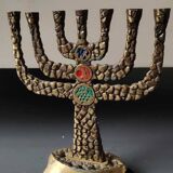Menorah/Candlestick with 7 light arms. In old gold patinated brass/Decor 12 astrological signs. Engraved Jerusalem. Height 14 cm