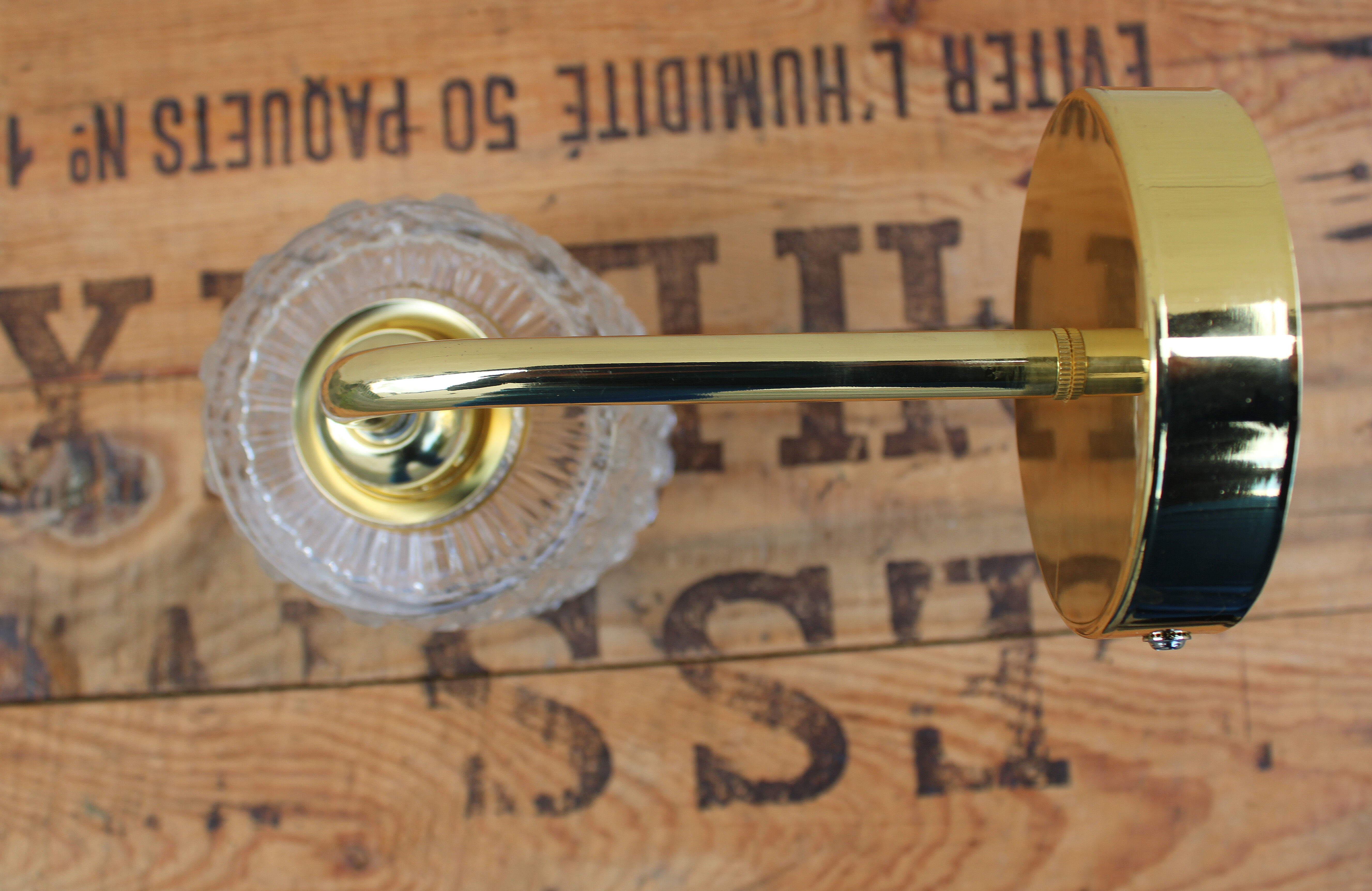 Brass and moulded glass sconce