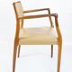 Pair of N.O. Moeller armchairs, model 65, in rosewood and light leather