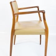 Pair of N.O. Moeller armchairs, model 65, in rosewood and light leather