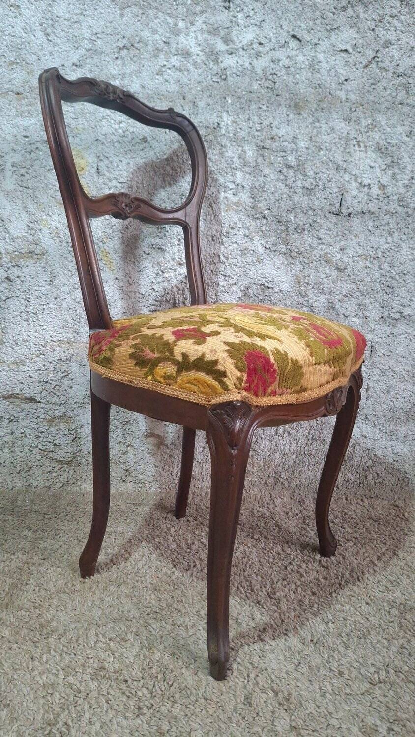 Carved walnut Napoleon III style velvet medallion chair