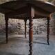 Antique drop-leaf dining table in walnut, France, circa 1900.