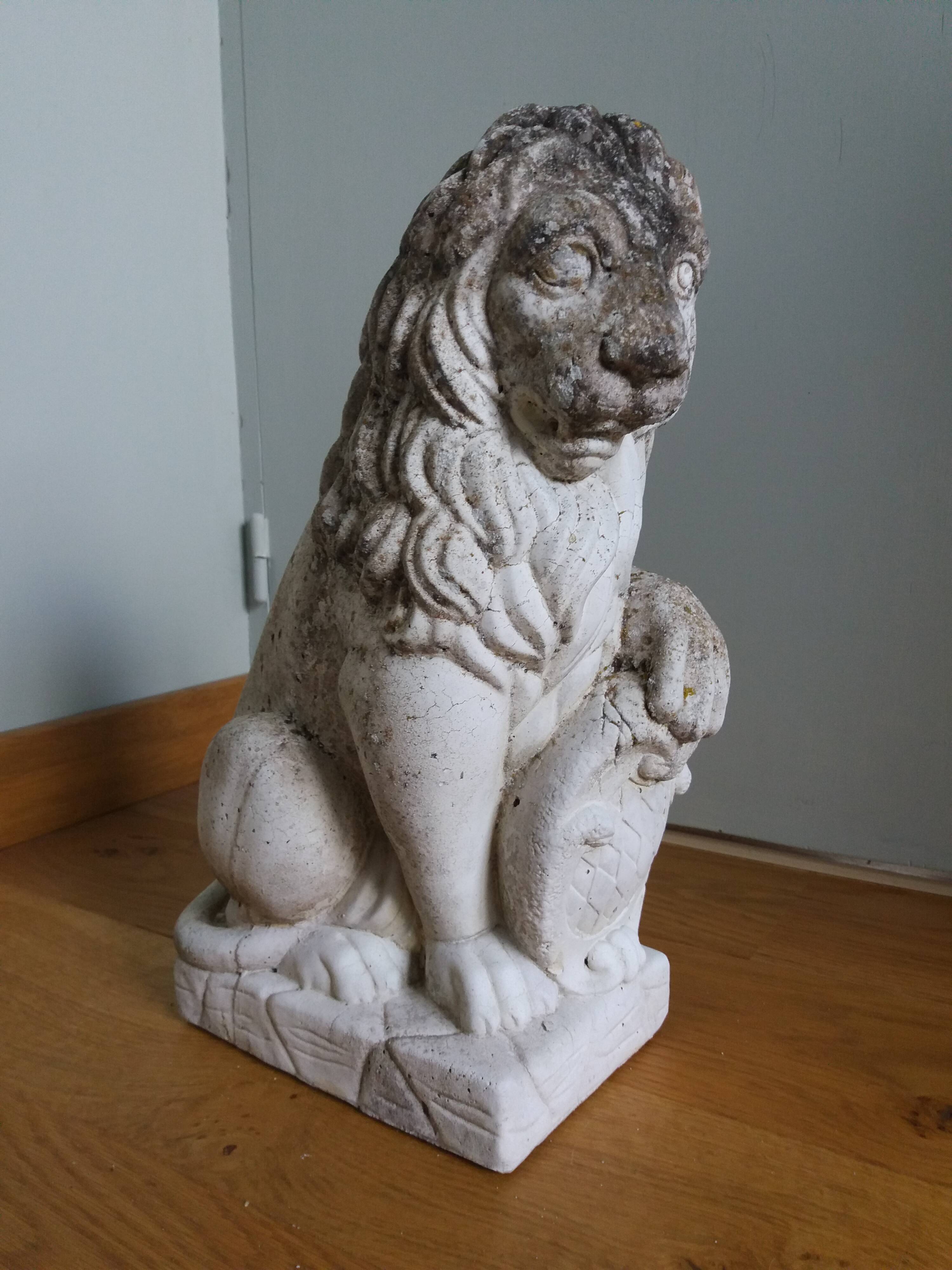 Lion garden statue in reconstituted stone