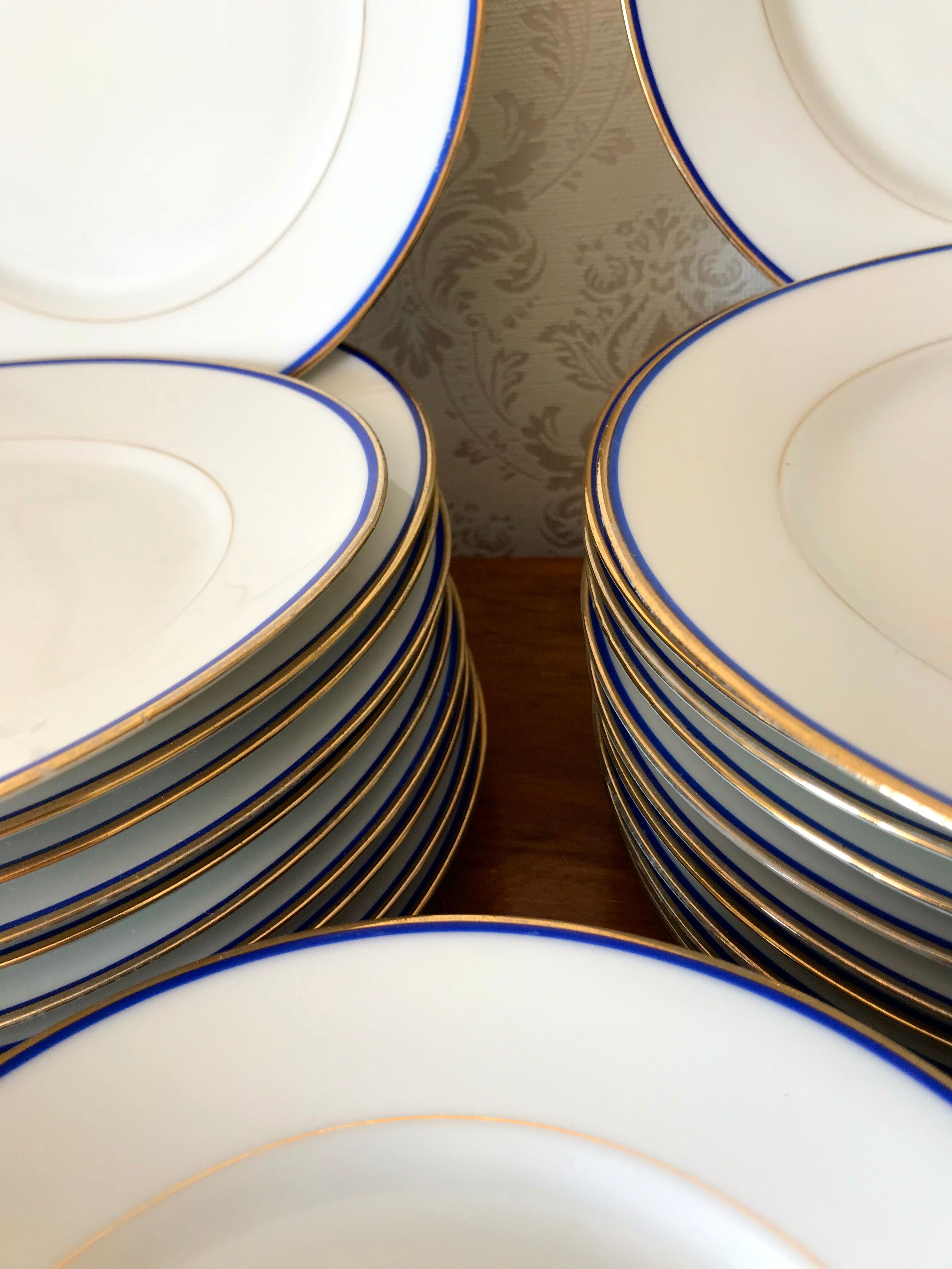 table service art deco limoges porcelain white border blue and gold 61 pieces signed