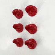 Set of 2 red "gancio 4702" coat hooks by olaf von bohr for kartell, 1970.