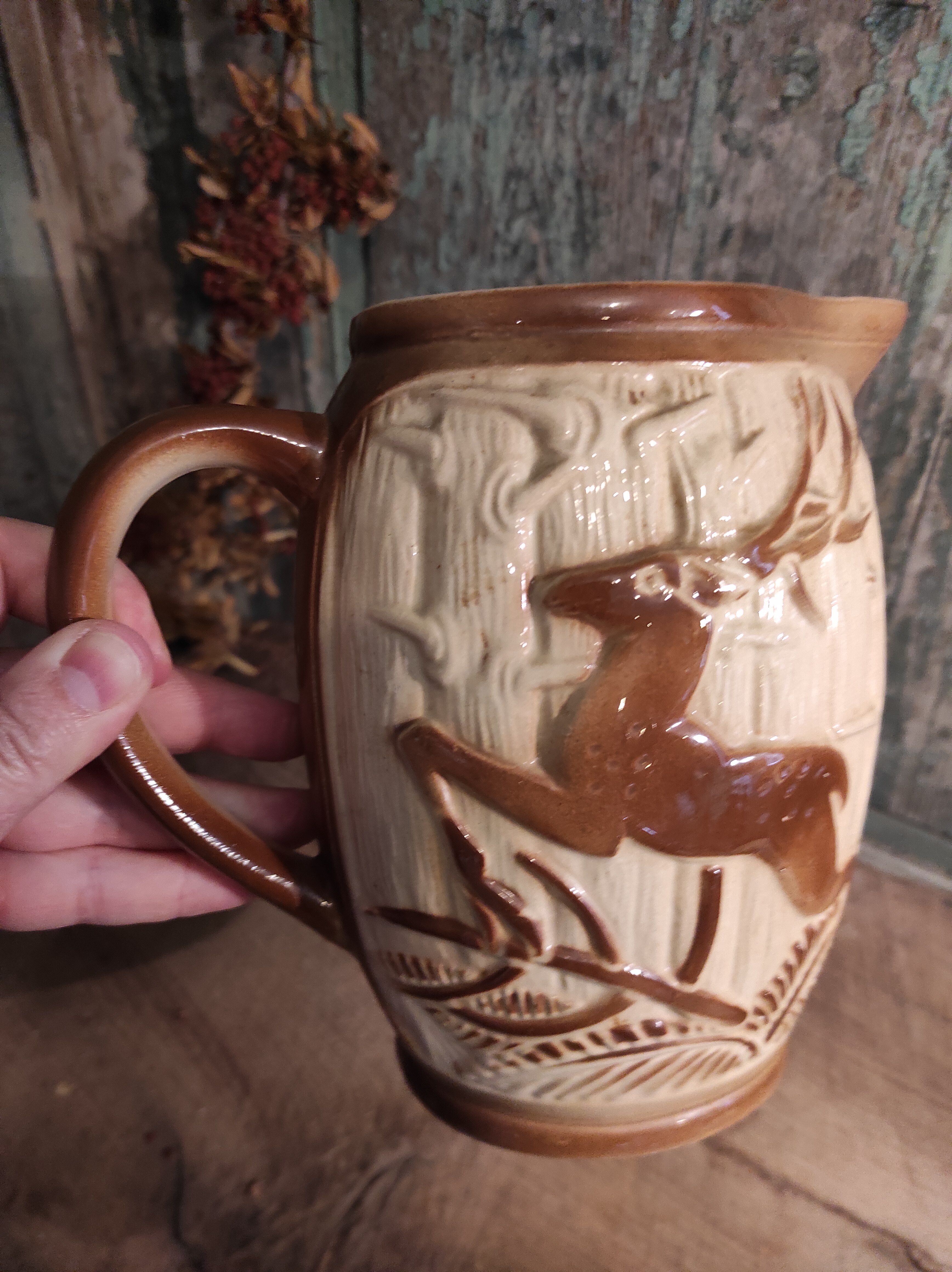 French vintage pitcher of St Clément, with a deer